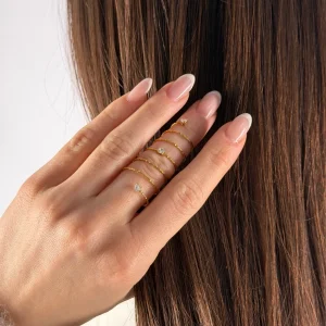 Anello spirare punti luce oro