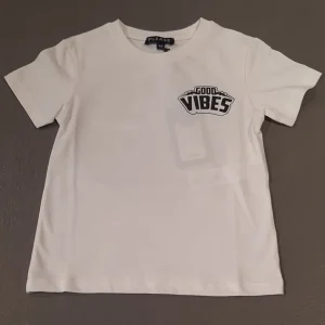 Tshirt Please a mezza manica bianca con stampa sul retro e piccola stampa sul davanti