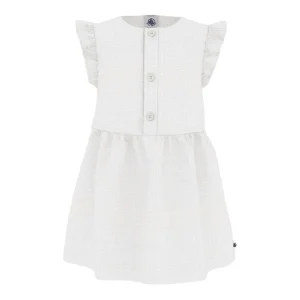 Abito Petit Bateau di colore bianco con bottoncini sul davanti e volant sulle spalle