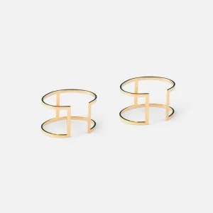 Coppia di bracciali in metallo dorato