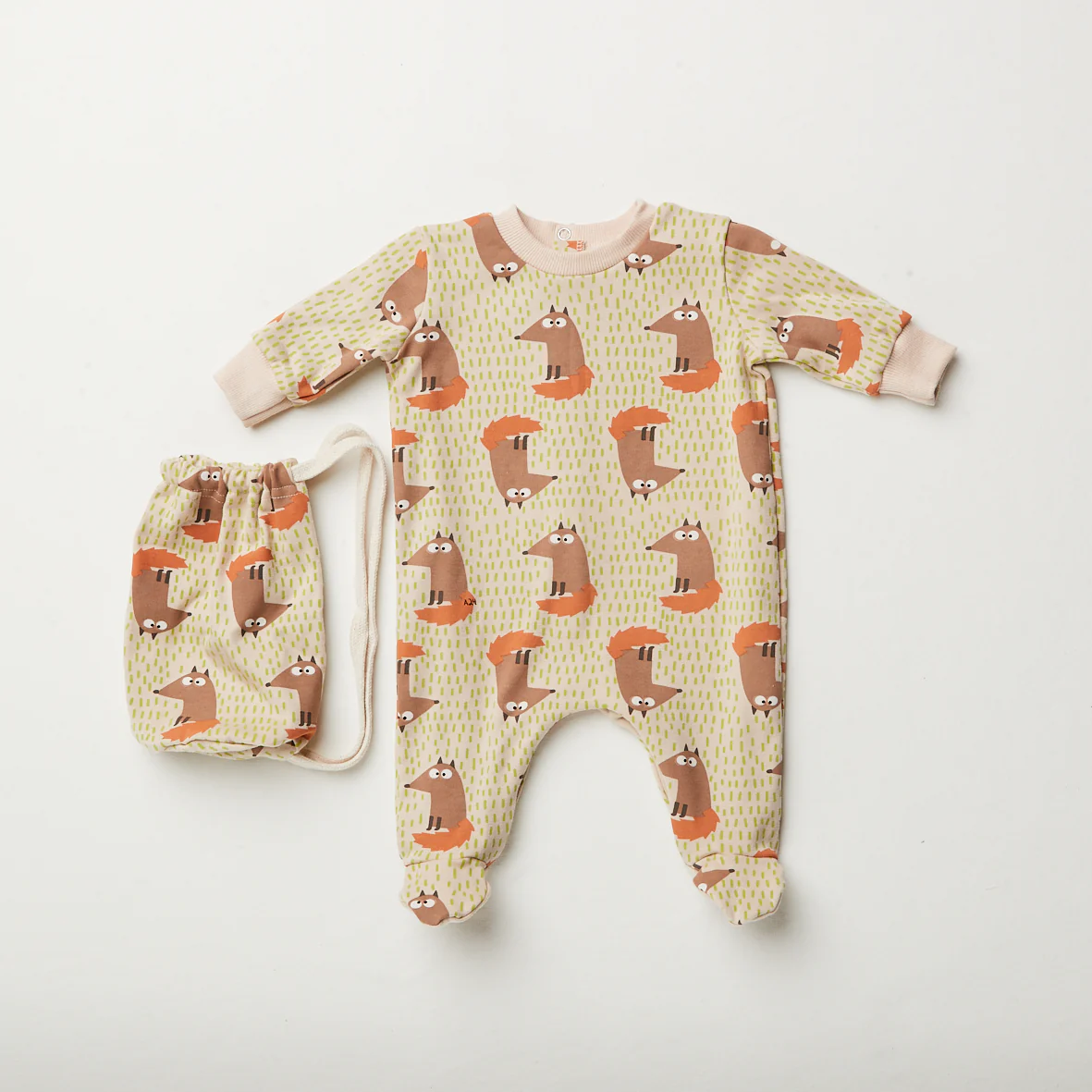 Aventiquattrore tutina arancio e panna con castoro - immagine 2